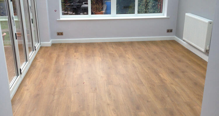 Amtico tiles installed in a brand-new conservatory in Cheadle Hulme